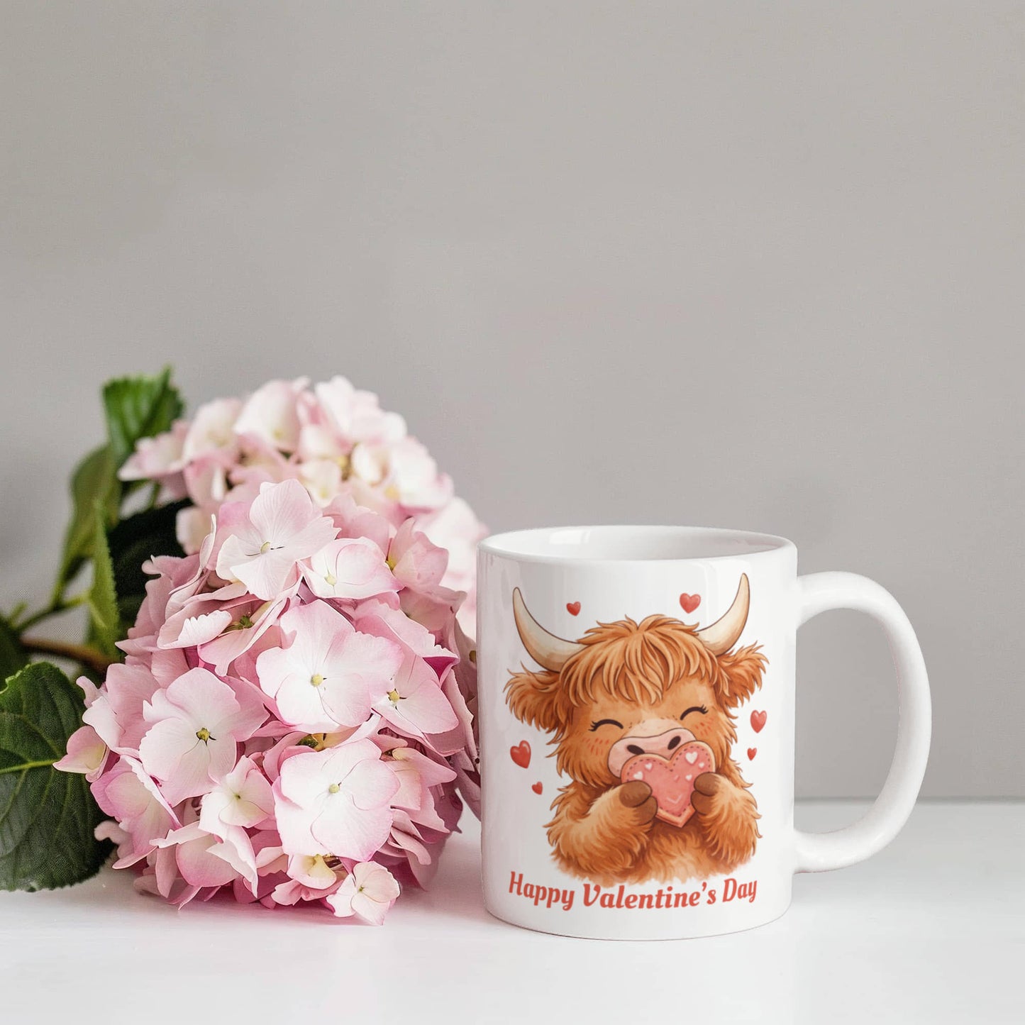 Valentine Highland Cow Mug – Cute Heart-Holding Cow Cup